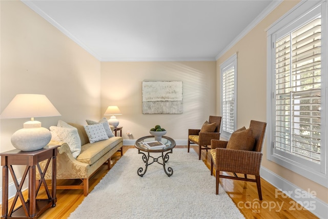 1336 Dobson Dr, Waxhaw, NC 28173 - living room with wood finished floors and crown molding