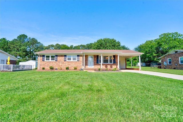 3413 Fallston Rd, Shelby, NC 28150 - ranch-style home featuring concrete driveway, an attached carport, brick siding, and covered porch