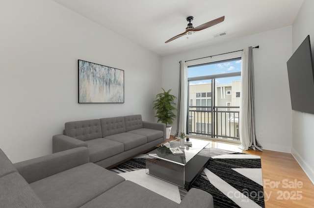3271 Noda Blvd, Charlotte, NC 28205 - living room with wood finished floors and ceiling fan