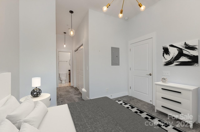 3271 Noda Blvd, Charlotte, NC 28205 - carpeted foyer entrance featuring electric panel and a chandelier