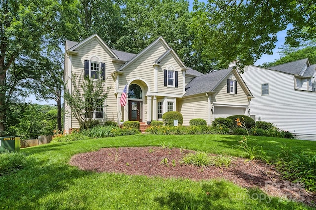 12712 Hollyhock Ln, Huntersville, NC 28078 - traditional home featuring a front lawn and a shingled roof