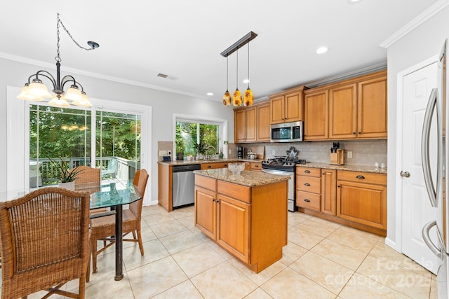 12712 Hollyhock Ln, Huntersville, NC 28078 - kitchen featuring stainless steel appliances, a chandelier, a kitchen island, decorative backsplash, and ornamental molding