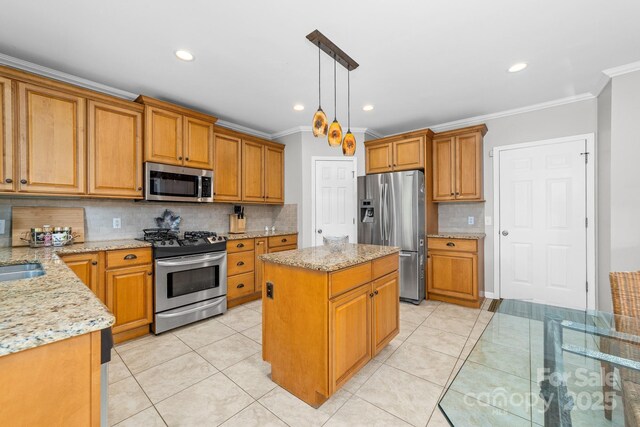 12712 Hollyhock Ln, Huntersville, NC 28078 - kitchen with stainless steel appliances, tasteful backsplash, crown molding, light stone countertops, and a kitchen island