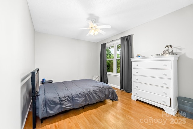 12712 Hollyhock Ln, Huntersville, NC 28078 - bedroom featuring light wood finished floors and ceiling fan