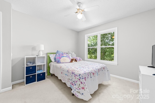 12712 Hollyhock Ln, Huntersville, NC 28078 - bedroom featuring light carpet, a textured ceiling, and a ceiling fan