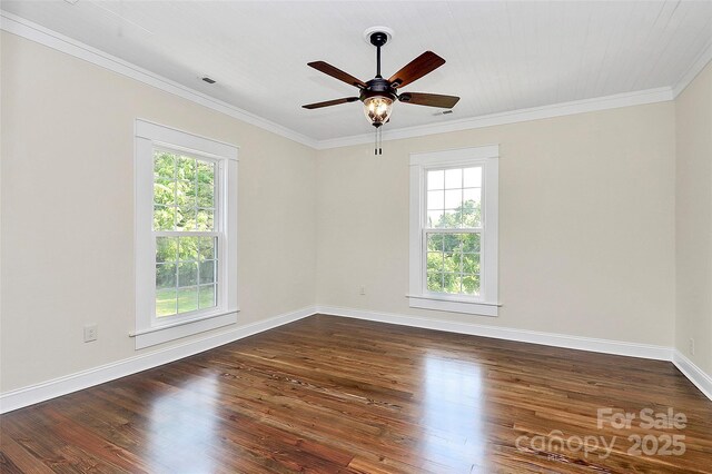 604 Ferguson Ridge Rd, Gastonia, NC 28052 - empty room featuring plenty of natural light, dark wood-type flooring, ceiling fan, and ornamental molding