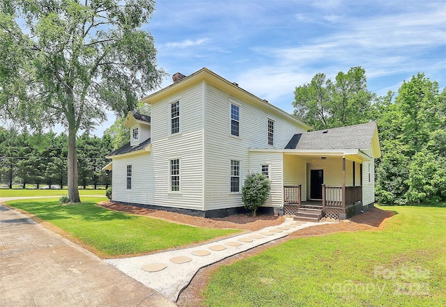 604 Ferguson Ridge Rd, Gastonia, NC 28052 - view of front of house with a front lawn, a chimney, and roof with shingles