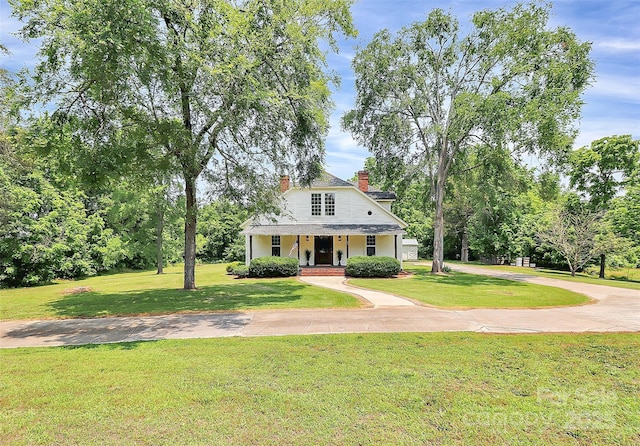 604 Ferguson Ridge Rd, Gastonia, NC 28052 - view of front of property with a chimney, a front yard, and driveway