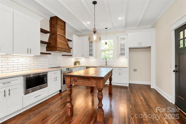 604 Ferguson Ridge Rd, Gastonia, NC 28052 - kitchen with appliances with stainless steel finishes, wood counters, decorative light fixtures, tasteful backsplash, and white cabinets
