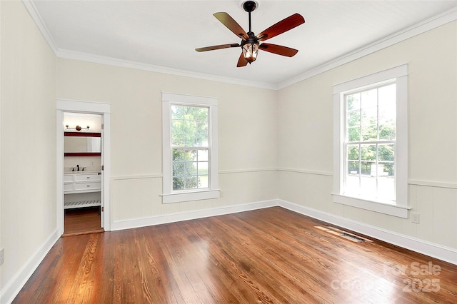 604 Ferguson Ridge Rd, Gastonia, NC 28052 - spare room with wood finished floors, a ceiling fan, crown molding, and baseboards
