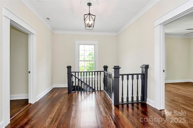 604 Ferguson Ridge Rd, Gastonia, NC 28052 - hall with an upstairs landing, wood finished floors, ornamental molding, a chandelier, and baseboards