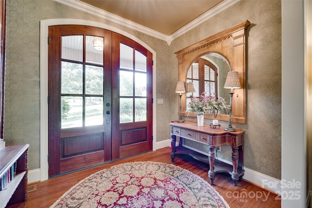 103 3rd St SW, Catawba, NC 28609 - foyer featuring wood finished floors, french doors, a textured wall, and ornamental molding
