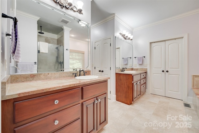 103 3rd St SW, Catawba, NC 28609 - bathroom featuring ornamental molding, a shower stall, two vanities, and tile patterned flooring