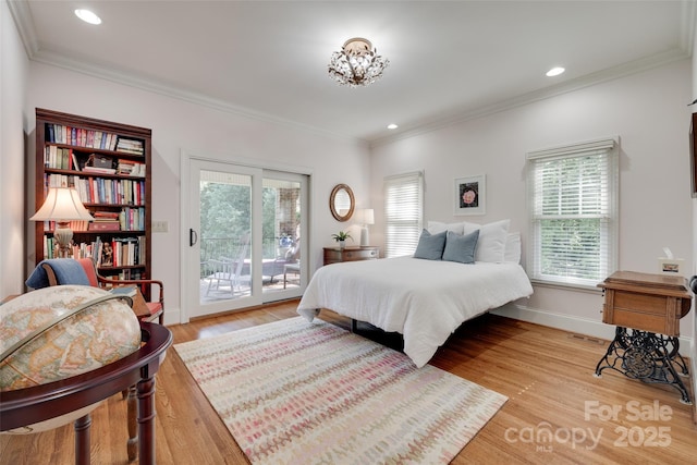 103 3rd St SW, Catawba, NC 28609 - bedroom featuring access to outside, light wood-style flooring, crown molding, recessed lighting, and a chandelier