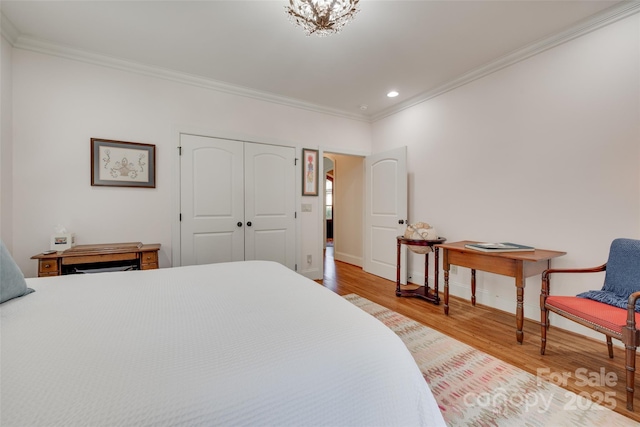 103 3rd St SW, Catawba, NC 28609 - bedroom with ornamental molding, light wood-style flooring, recessed lighting, and a closet