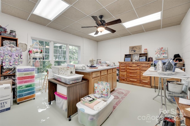 103 3rd St SW, Catawba, NC 28609 - misc room featuring finished concrete floors, a drop ceiling, and ceiling fan