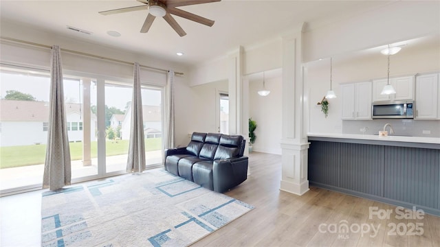 7651 Fenn Way, Fort Mill, SC 29707 - living area with ceiling fan and light wood-style floors