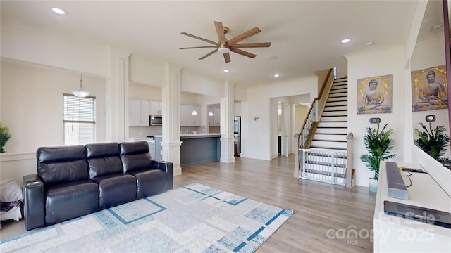 7651 Fenn Way, Fort Mill, SC 29707 - living area featuring ceiling fan, light wood-style flooring, stairway, and recessed lighting
