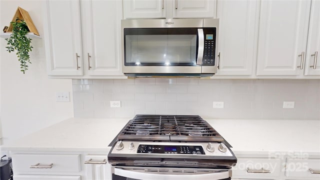 7651 Fenn Way, Fort Mill, SC 29707 - kitchen featuring stainless steel appliances, white cabinets, and backsplash