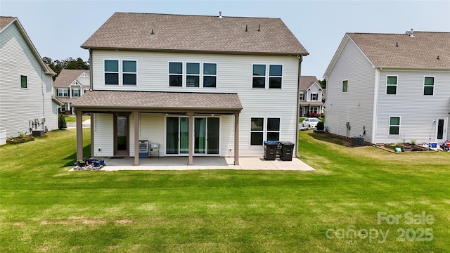 7651 Fenn Way, Fort Mill, SC 29707 - back of property featuring a patio, a yard, a shingled roof, and cooling unit