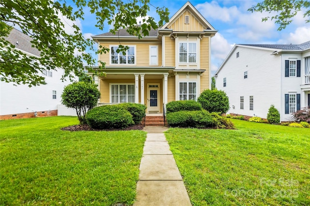 187 Water Oak Dr, Mooresville, NC 28117 - view of front of house featuring a front lawn, board and batten siding, and covered porch