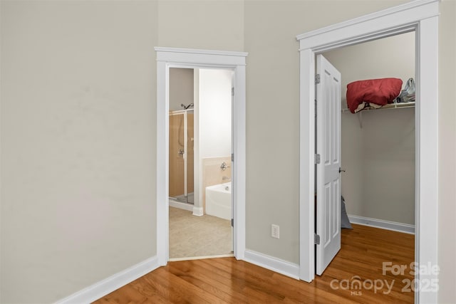 187 Water Oak Dr, Mooresville, NC 28117 - unfurnished bedroom featuring wood finished floors and a closet