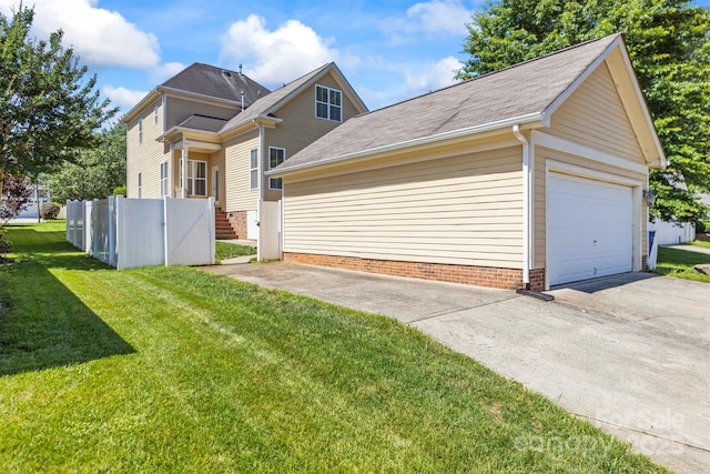 187 Water Oak Dr, Mooresville, NC 28117 - view of side of home with concrete driveway and a shingled roof