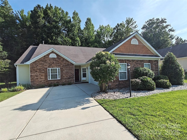 509 Settlers Grove Ln, Salisbury, NC 28146 - view of front of house featuring stone siding and a front lawn