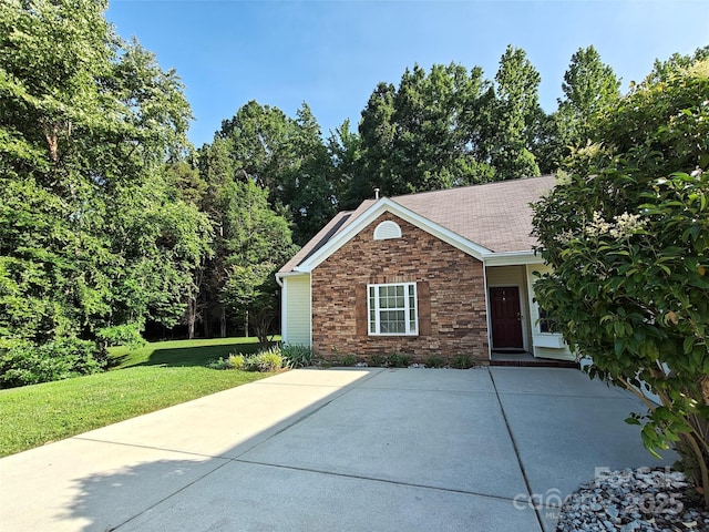 509 Settlers Grove Ln, Salisbury, NC 28146 - view of front of property with a front lawn and roof with shingles