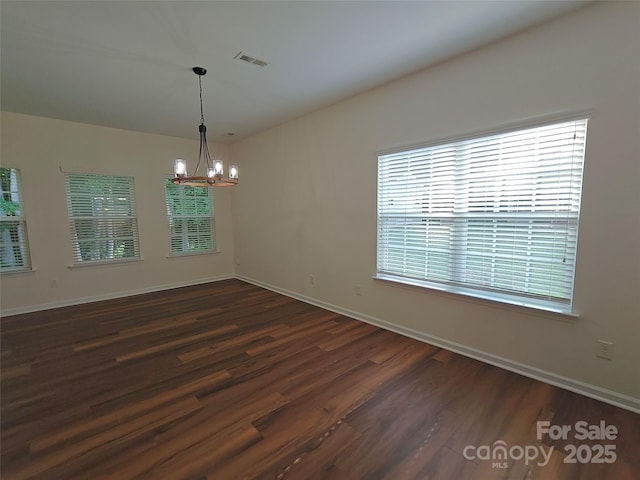 509 Settlers Grove Ln, Salisbury, NC 28146 - empty room featuring a chandelier and dark wood-style floors