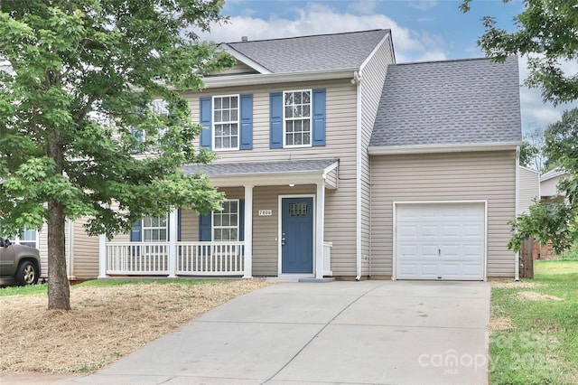 7806 Mcgarry Trl, Charlotte, NC 28214 - traditional home featuring covered porch, driveway, roof with shingles, and an attached garage