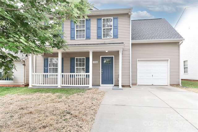 7806 Mcgarry Trl, Charlotte, NC 28214 - traditional home featuring a porch, driveway, and a shingled roof
