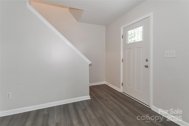 7806 Mcgarry Trl, Charlotte, NC 28214 - entrance foyer with dark wood-type flooring and stairway