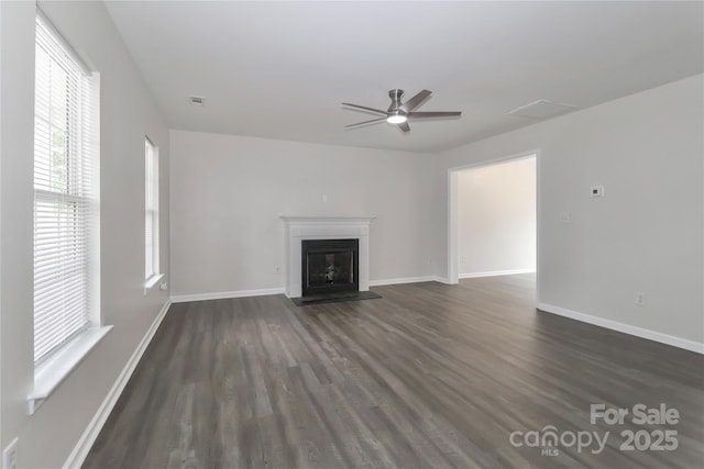 7806 Mcgarry Trl, Charlotte, NC 28214 - unfurnished living room with dark wood-style flooring, a ceiling fan, and a fireplace with flush hearth