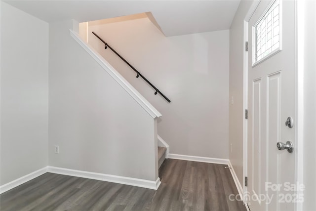 7806 Mcgarry Trl, Charlotte, NC 28214 - stairway with wood finished floors and baseboards