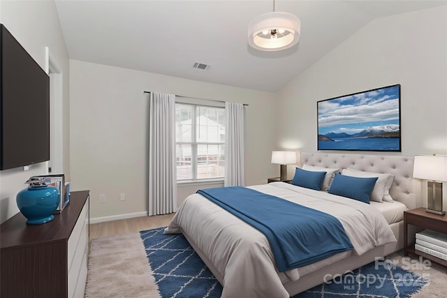 7806 Mcgarry Trl, Charlotte, NC 28214 - bedroom featuring vaulted ceiling and light wood-style flooring