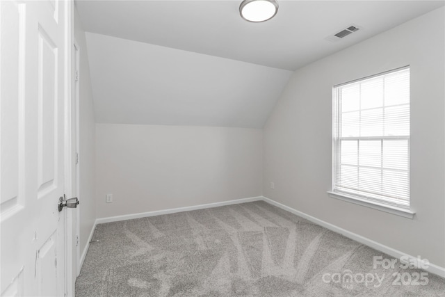 7806 Mcgarry Trl, Charlotte, NC 28214 - additional living space with vaulted ceiling and carpet