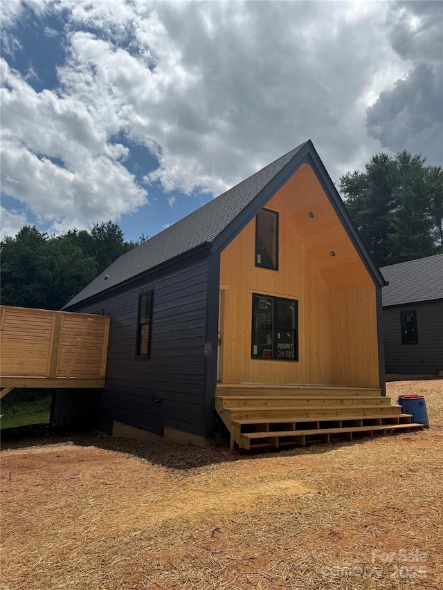 798 Country Club Dr, Waynesville, NC 28786 - view of property exterior featuring a wooden deck and a shingled roof