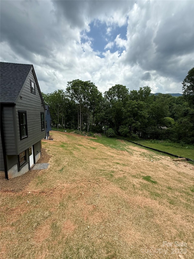 798 Country Club Dr, Waynesville, NC 28786 - view of grassy yard with a garage