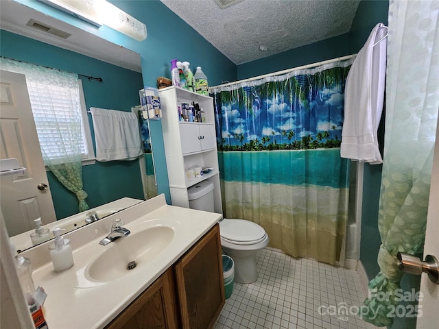 501 N Johnson St, Monroe, NC 28112 - full bathroom with toilet, tile patterned flooring, vanity, a textured ceiling, and a shower with curtain