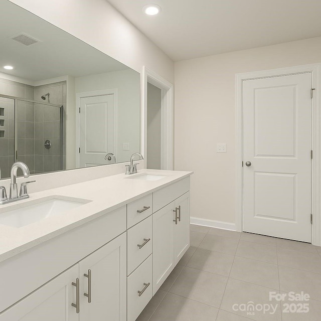 3833 Crossbane St, Kannapolis, NC 28081 - bathroom featuring double vanity, tile patterned floors, a stall shower, recessed lighting, and baseboards