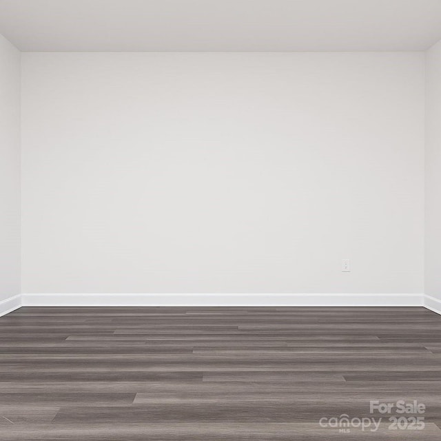 3833 Crossbane St, Kannapolis, NC 28081 - unfurnished room with baseboards and dark wood finished floors