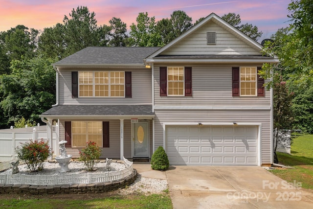 10816 Pointer Ridge Dr, Charlotte, NC 28214 - traditional-style house with driveway, a porch, an attached garage, and a shingled roof