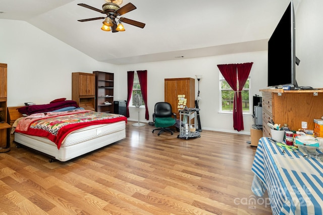 10816 Pointer Ridge Dr, Charlotte, NC 28214 - bedroom featuring light wood-style floors, vaulted ceiling, baseboards, and a ceiling fan