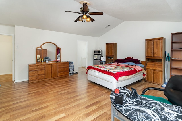 10816 Pointer Ridge Dr, Charlotte, NC 28214 - bedroom with vaulted ceiling, light wood-style floors, and a ceiling fan