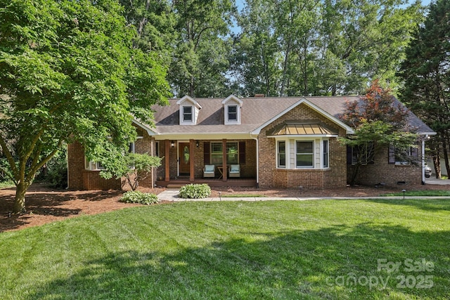 10311 Windtree Ln, Charlotte, NC 28215 - view of front of property featuring a porch, a front lawn, and brick siding