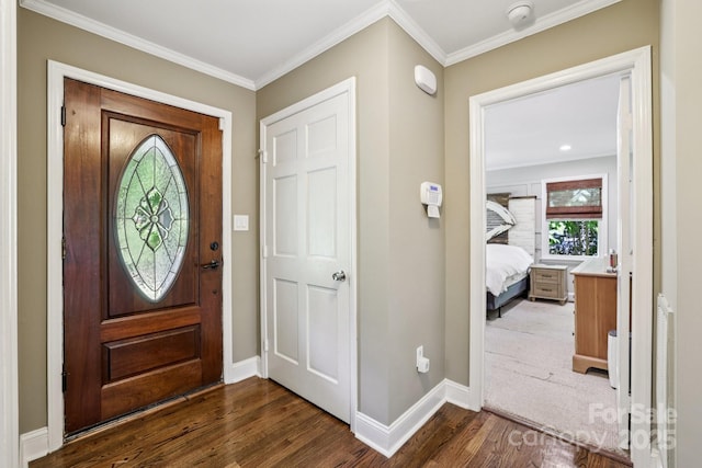 10311 Windtree Ln, Charlotte, NC 28215 - entrance foyer featuring dark wood-style floors, baseboards, and ornamental molding