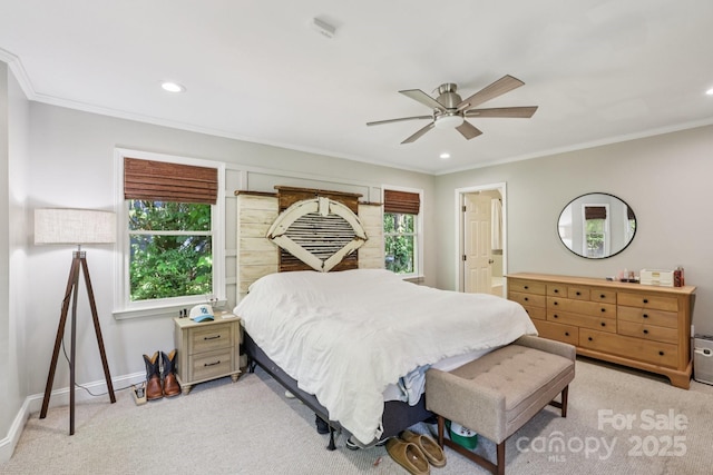 10311 Windtree Ln, Charlotte, NC 28215 - bedroom with ornamental molding, light carpet, recessed lighting, baseboards, and ceiling fan