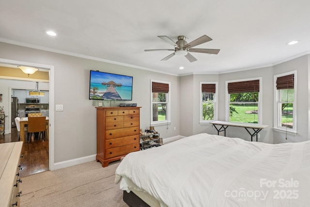 10311 Windtree Ln, Charlotte, NC 28215 - bedroom with freestanding refrigerator, recessed lighting, crown molding, baseboards, and a ceiling fan