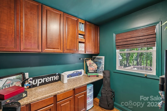 10311 Windtree Ln, Charlotte, NC 28215 - washroom featuring wood finished floors
